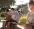 Male student in art class, drawing outside
