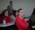 Students look at a presentation in class
