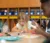 Two children color pictures in class