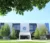 White building with black glass sections rises over landscape