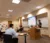 A group of faculty listen to a presentation