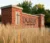 A picture of a brick sign with the words "Dordt University" on it.