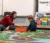 A teacher works with a student one on one