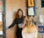 A teacher gets ready to open the door for a student