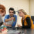 two physics students work on physics lab project