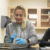 Female Dordt student analyzes animal organ with her gloves on