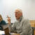 psychology professor points finger while explaining