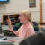 A student raises her hand during class