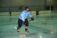 A picture of a person playing ice hockey