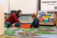 A teacher works with a student one on one