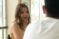 A female student talks with a male student