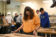Engineering students measure some wood for a project