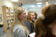 Students laugh while talking in a group