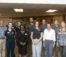 A group photo of 11 new faculty members