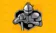 The Defender Athletics knight logo with a gold pattern background